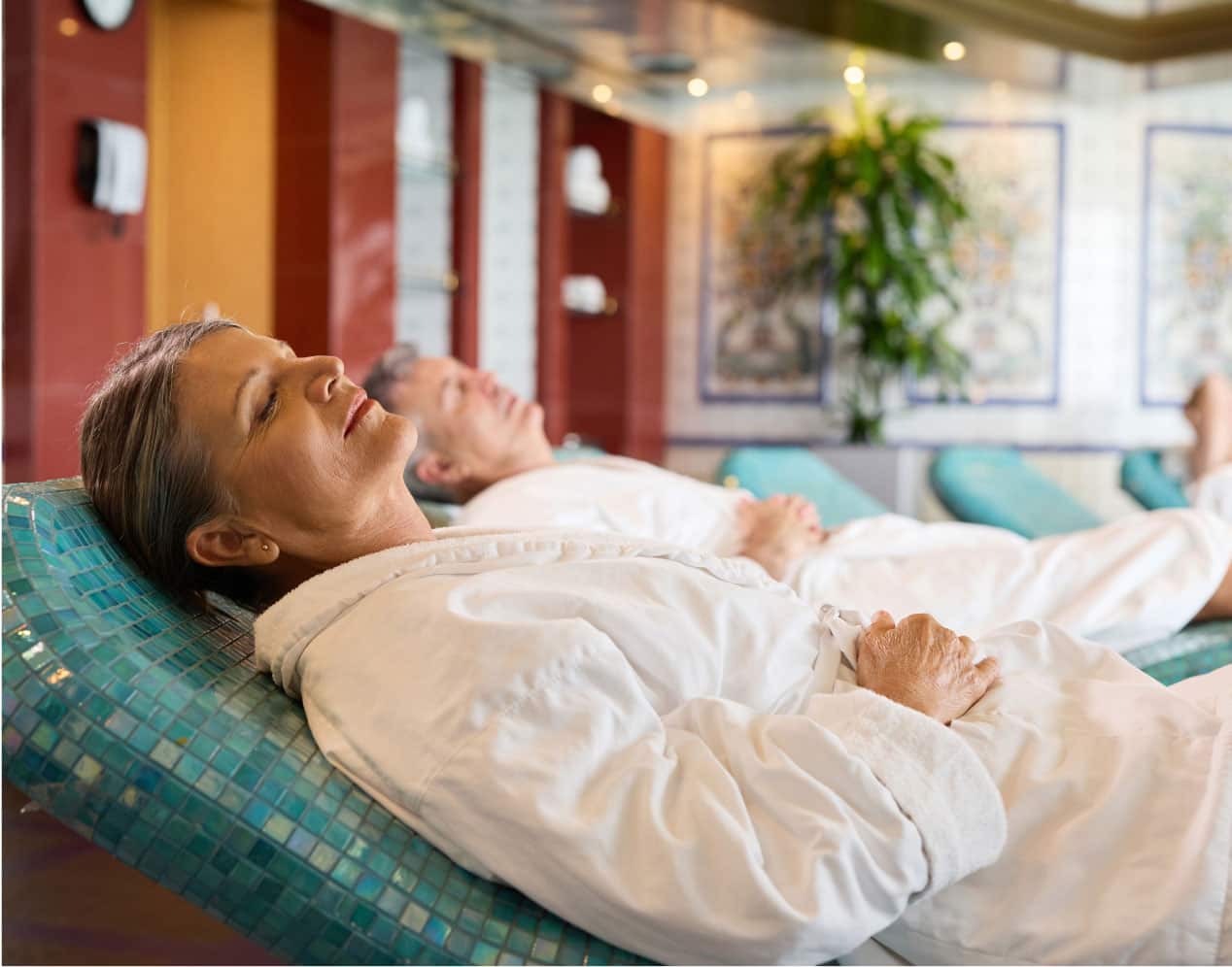 Couple lounging in thermal suite