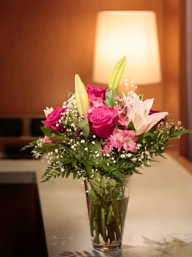 Flower bouquet in glass vase of Neptune Suite on board Zuiderdam