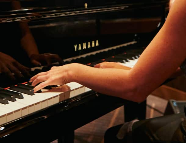 Onboard pianist in close up performance